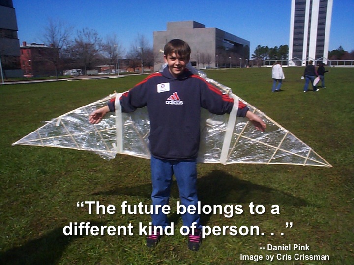 Boy wearing glider wings with quote by Daniel Pink, The Future Belongs to a Different Kind of Person