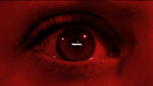 Title emerging from the pupil of Madeline's eye.